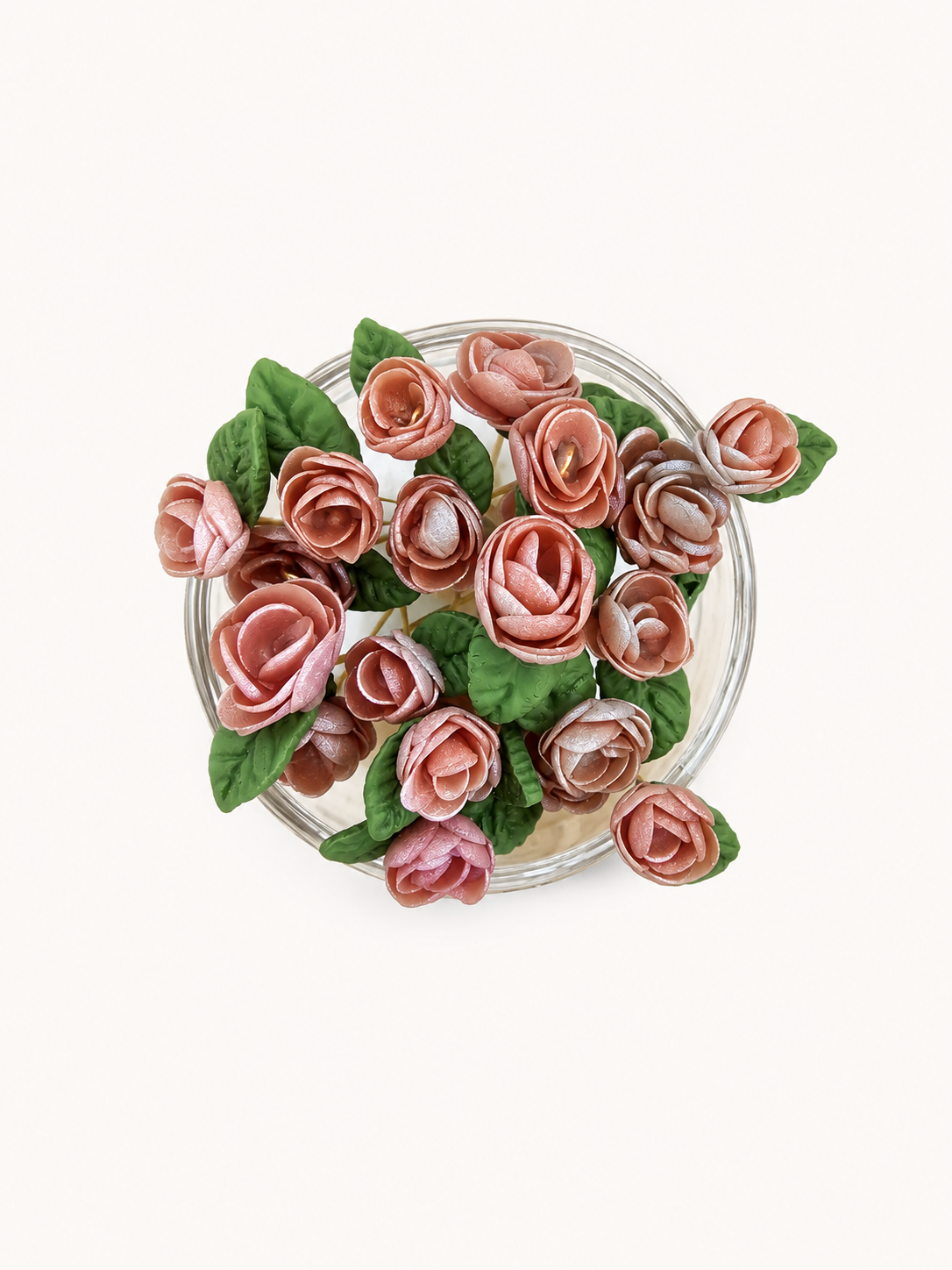 A pot of rose gold roses