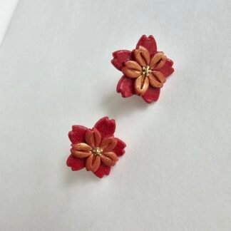 Handcrafted crimson floral polymer clay stud earrings with gold-toned centre, 2cm, stainless steel posts