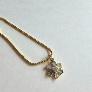Gold plated 925 silver necklace with a snowflake-shaped crystal pendant featuring blue and clear stones