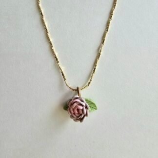 Gold plated 925 silver necklace with a petite handmade blush pink polymer clay rose and green leaf detail