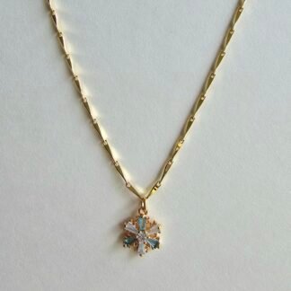 Gold plated 925 silver necklace with a snowflake-shaped crystal pendant featuring blue and clear stones on a delicate chain